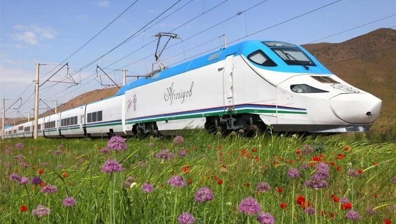 Afrosiyob high-speed train at a railway station in Uzbekistan